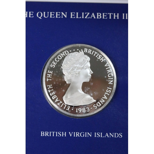 127 - A Franklin Mint Queen Elizabeth II Thirtieth Anniversary silver proof crown coin set, five coin set ... 