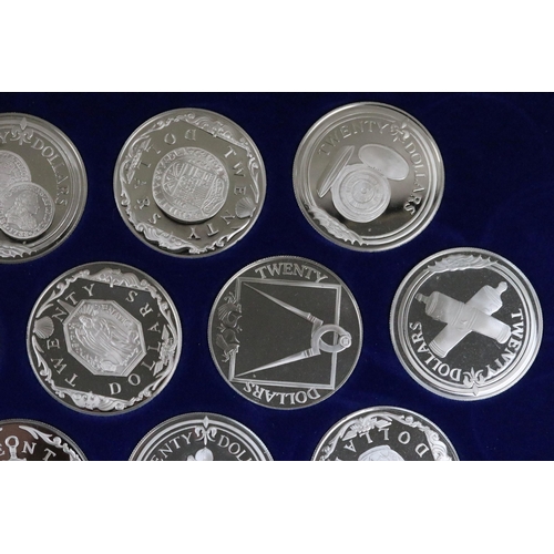 129 - The Treasure coins of the Caribbean twenty five silver proof coin set, within original fitted displa... 