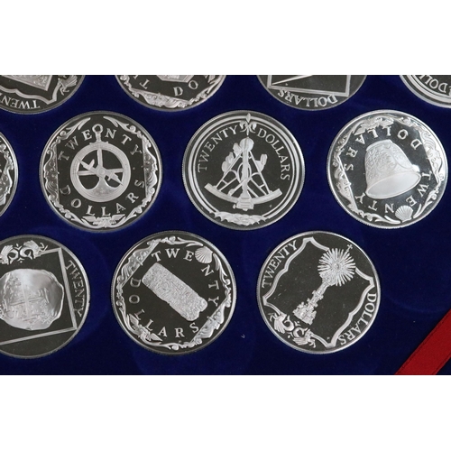 129 - The Treasure coins of the Caribbean twenty five silver proof coin set, within original fitted displa... 