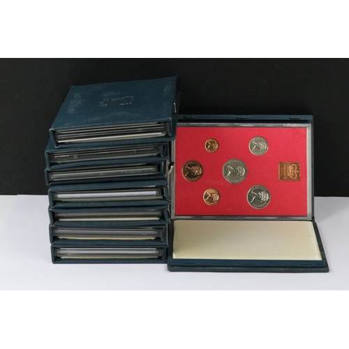 136 - A collection of eight Royal Mint brilliant uncirculated coin year sets to include 1971, 1982, 1989, ... 