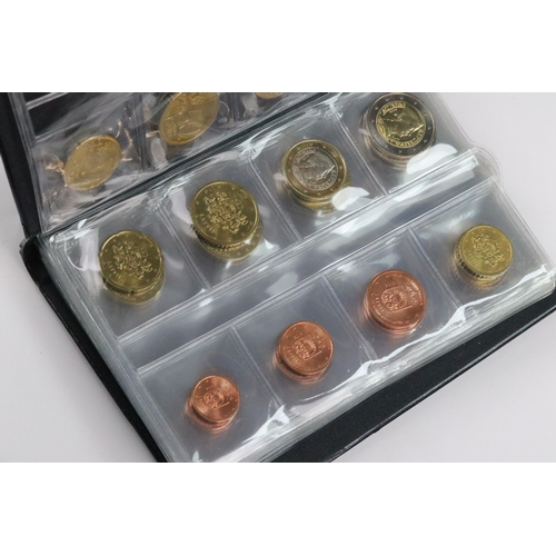 138 - A collection of uncirculated Euro coins from various European countries contained within two collect... 