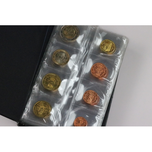 138 - A collection of uncirculated Euro coins from various European countries contained within two collect... 