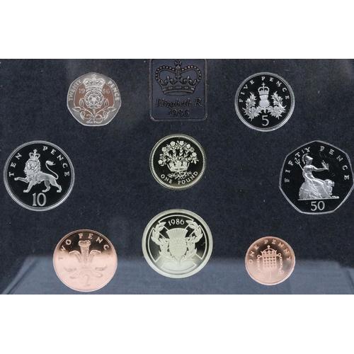 139 - A collection of four Royal Mint brilliant uncirculated coin year sets to include 1984, 1991, 1986 an... 