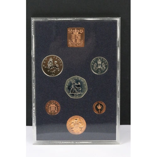 143 - A collection of British Royal Mint coin sets to include 1976, 1974, 1983, 1981, 1979, 1985, 1975, 19... 