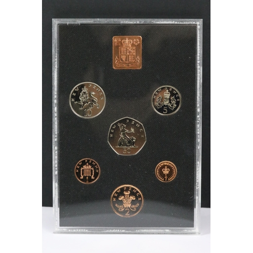 143 - A collection of British Royal Mint coin sets to include 1976, 1974, 1983, 1981, 1979, 1985, 1975, 19... 