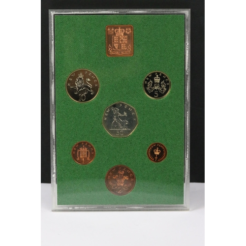 143 - A collection of British Royal Mint coin sets to include 1976, 1974, 1983, 1981, 1979, 1985, 1975, 19... 