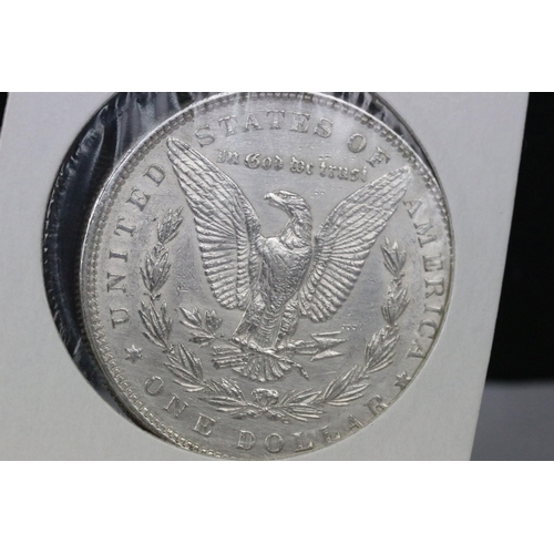 145 - A collection of three American silver dollars to include 1885, 1926 and 2014 examples.