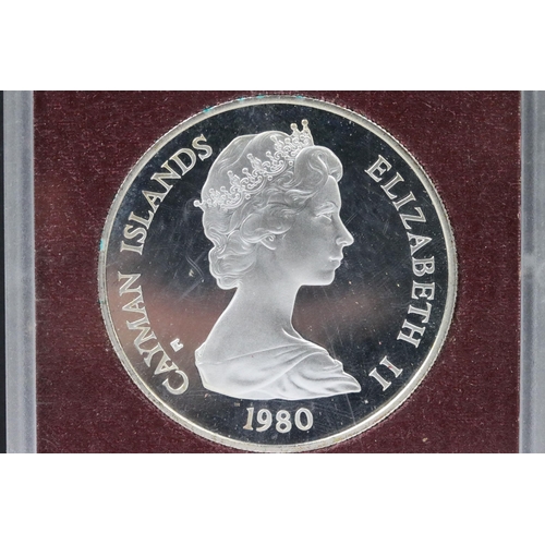 166 - Two Queen Elizabeth II Cayman Islands 1980 $25 silver proof coins encapsulated within cases.