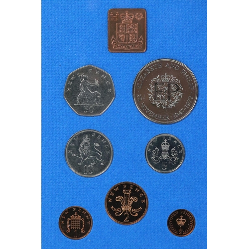 168 - A collection of nine Royal Mint brilliant uncirculated coin year sets to include 1974, 1975, 1976, 1... 