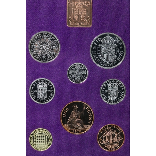 169 - A collection of eight Royal Mint brilliant uncirculated coin sets to include Gilbert Islands, Bhutan... 