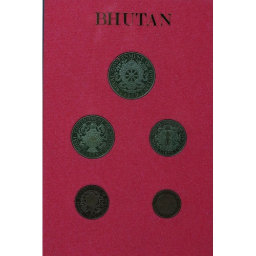 169 - A collection of eight Royal Mint brilliant uncirculated coin sets to include Gilbert Islands, Bhutan... 