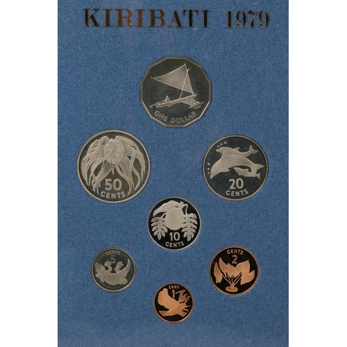 169 - A collection of eight Royal Mint brilliant uncirculated coin sets to include Gilbert Islands, Bhutan... 