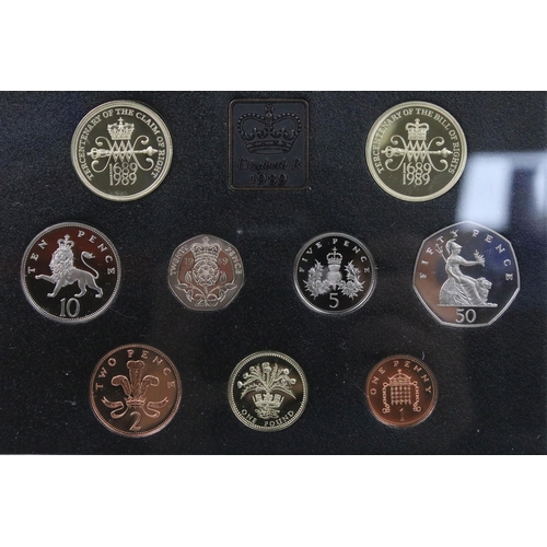 176 - A collection of six Royal Mint United Kingdom Queen Elizabeth II proof coin annual year sets to incl... 