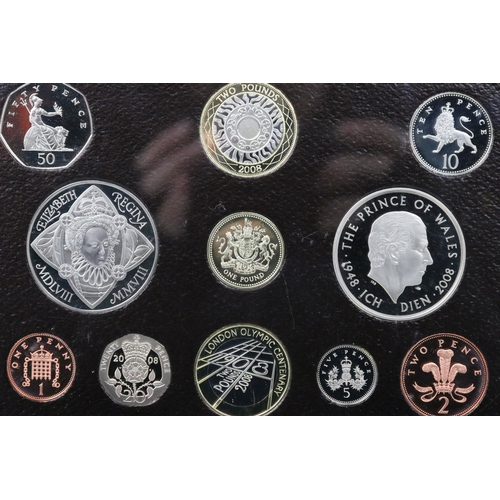 179 - A collection of four Royal Mint United Kingdom Queen Elizabeth II proof coin annual year sets to inc... 