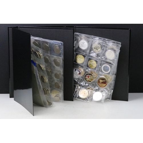 189 - A collection of mixed coins contained within two collectors folders to include a good selection of c... 