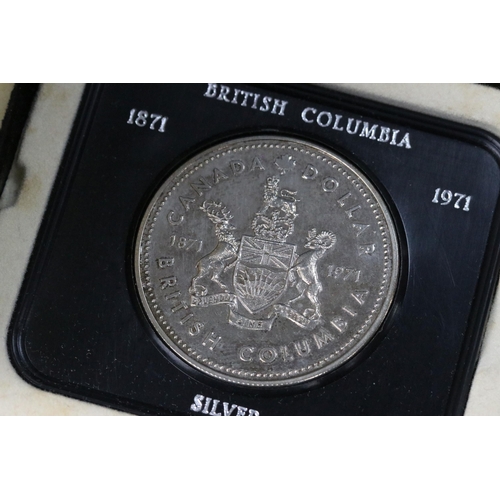 191 - A collection of five silver proof coin sets to include two silver sovereigns, two Canadian dollars a... 