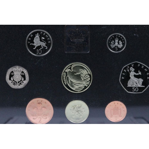 54 - A collection of six Royal Mint annual coin year sets to include brilliant uncirculated and proof exa... 