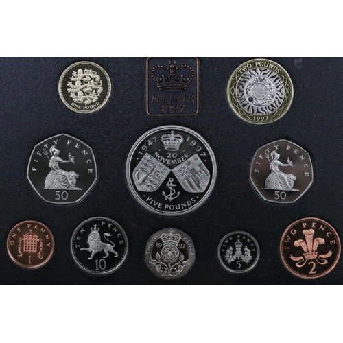 54 - A collection of six Royal Mint annual coin year sets to include brilliant uncirculated and proof exa... 