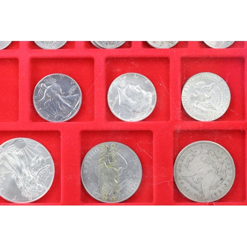 55 - A collection of United States of America coin contained within a Lindner collectors case.