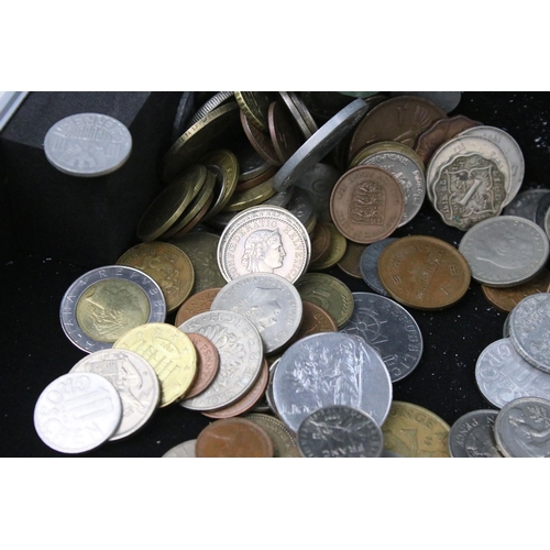 61 - A collection of mixed world / foreign coins contained within an aluminium coin collectors case.