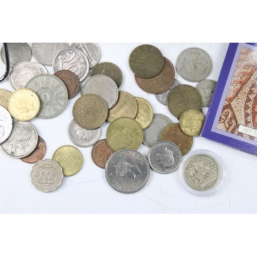 61 - A collection of mixed world / foreign coins contained within an aluminium coin collectors case.