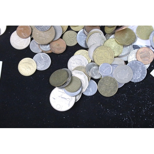 61 - A collection of mixed world / foreign coins contained within an aluminium coin collectors case.