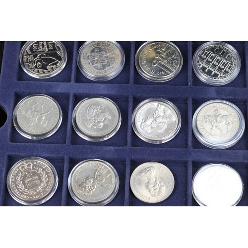 63 - A collection of coins to include a large quantity of commemorative crowns including circulated and u... 