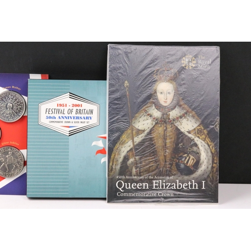 65 - A collection of mainly Royal Mint coin collectors packs to include annual year sets, 50p, £2 and sil... 