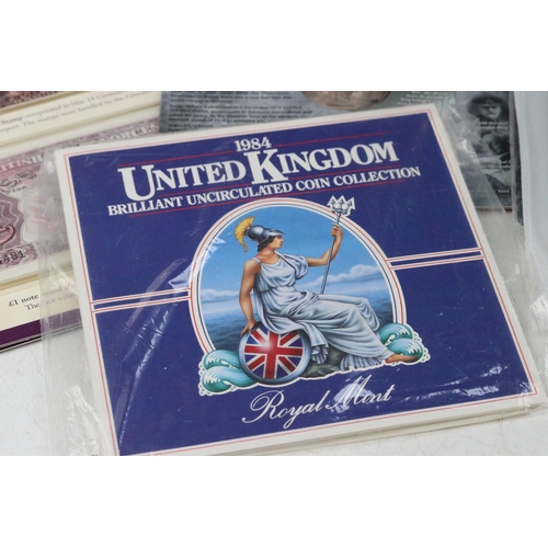 65 - A collection of mainly Royal Mint coin collectors packs to include annual year sets, 50p, £2 and sil... 