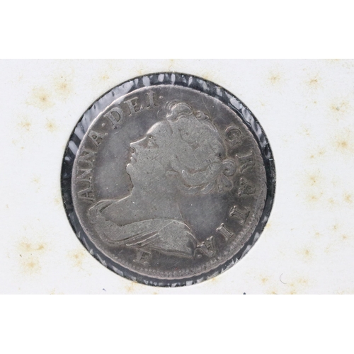 66 - A British early milled Queen Anne 1707 silver shilling coin.