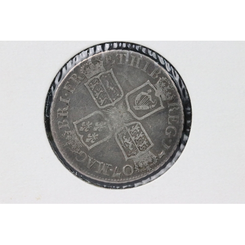 66 - A British early milled Queen Anne 1707 silver shilling coin.