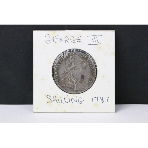 68 - A British early milled King George III 1787 silver shilling coin.