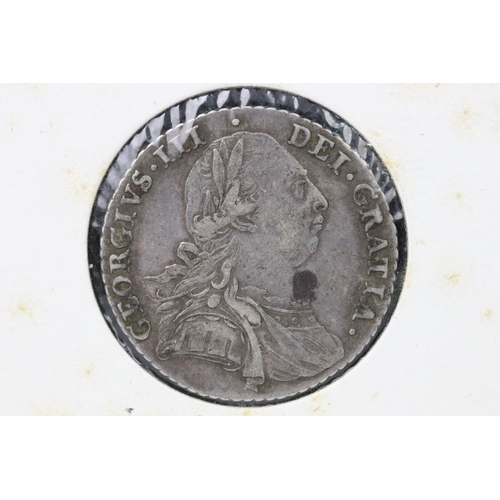 68 - A British early milled King George III 1787 silver shilling coin.