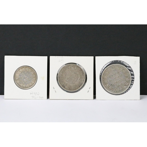 76 - A collection of British early milled silver coins to include King William IV, King George III and Ki... 