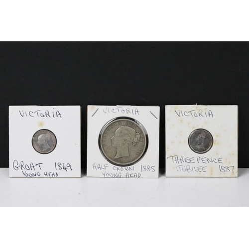 77 - A collection of British Queen Victoria pre decimal silver coins to include half crowns, gothic flori... 