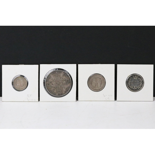 77 - A collection of British Queen Victoria pre decimal silver coins to include half crowns, gothic flori... 