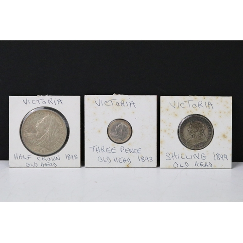 77 - A collection of British Queen Victoria pre decimal silver coins to include half crowns, gothic flori... 