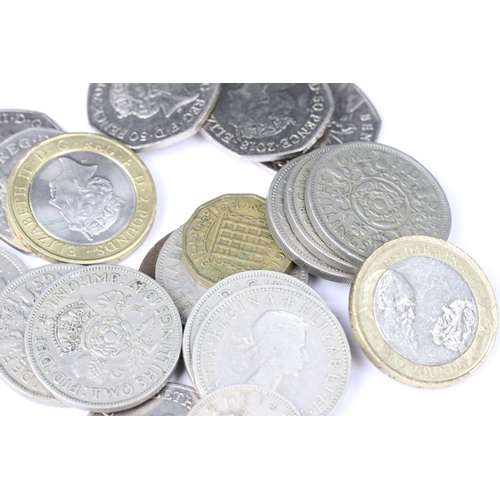 83 - A small collection of British decimal and pre decimal coins to include collectors 50p and £2 coins.