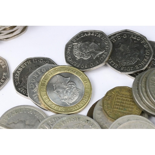 83 - A small collection of British decimal and pre decimal coins to include collectors 50p and £2 coins.