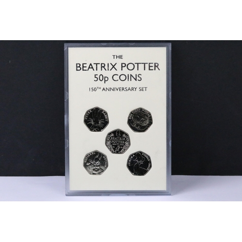 84 - A British Queen Elizabeth II Beatrix Potter 150th Anniversary 50p coin set, encapsulated within fitt... 