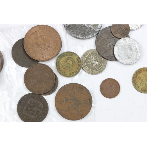 91 - A small collection of British pre decimal, decimal and world coins to include an early Arabic exampl... 