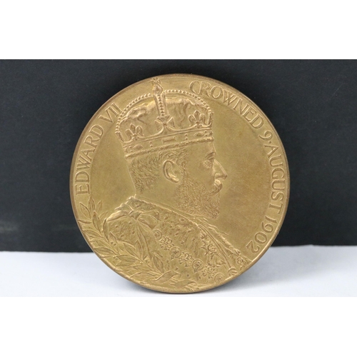 14 - A British 1902 King Edward VII coronation medallion together with a 1911 King George V coronation me... 