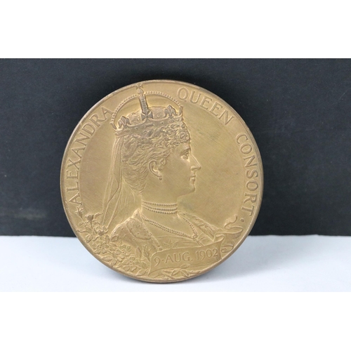 14 - A British 1902 King Edward VII coronation medallion together with a 1911 King George V coronation me... 