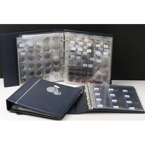 252 - A collection of British decimal coins contained within three collectors folders to include a selecti... 