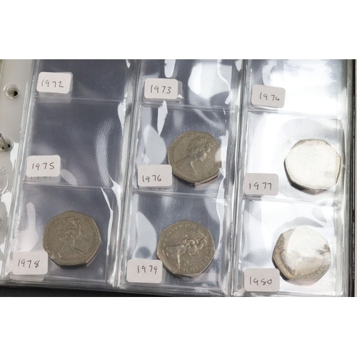 252 - A collection of British decimal coins contained within three collectors folders to include a selecti... 