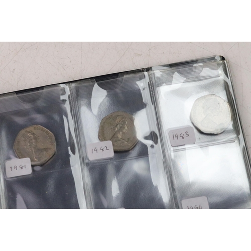 252 - A collection of British decimal coins contained within three collectors folders to include a selecti... 