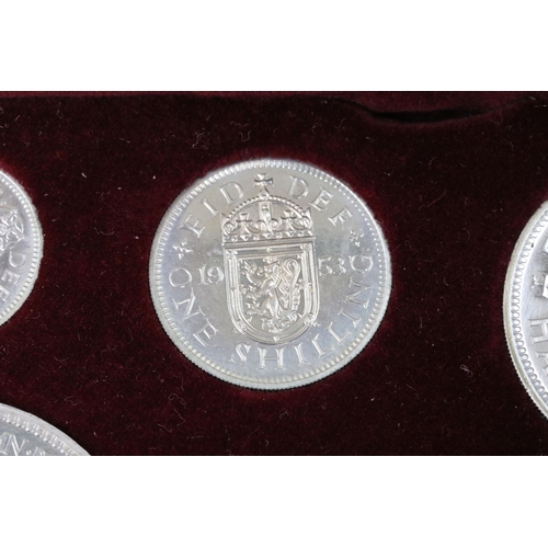 26 - A British Royal Mint Queen Elizabeth II 1953 ten coin specimen set within red fitted display case.