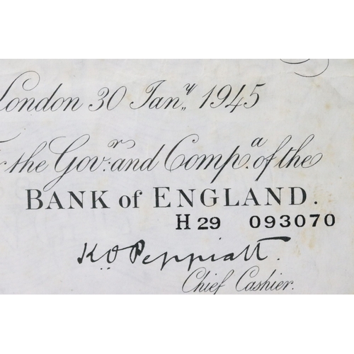 37 - A Bank of England white five pound note, Jan 30th 1945, K.P Peppiatt, serial No H 29 093070.