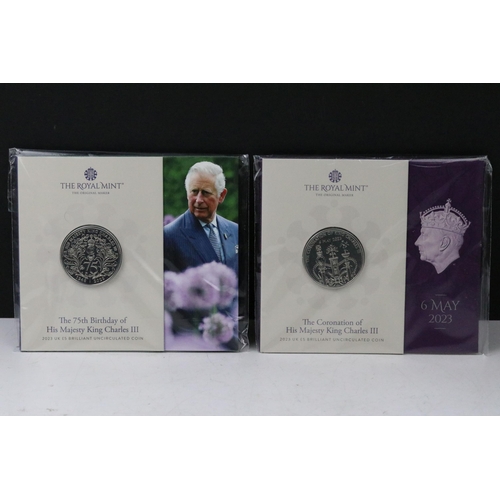 49 - A collection of British Royal Mint King Charles III coin sets to include sixpence, £5, 50p, 1/40oz g... 