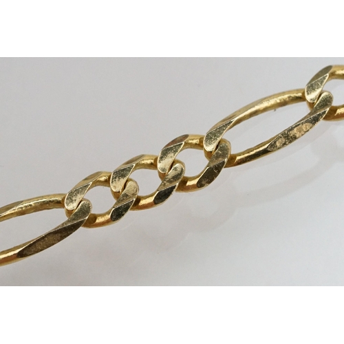 130 - 14ct gold figaro link necklace chain with lobster clasp. Marked 14k to jump link. Measures 24 inches... 